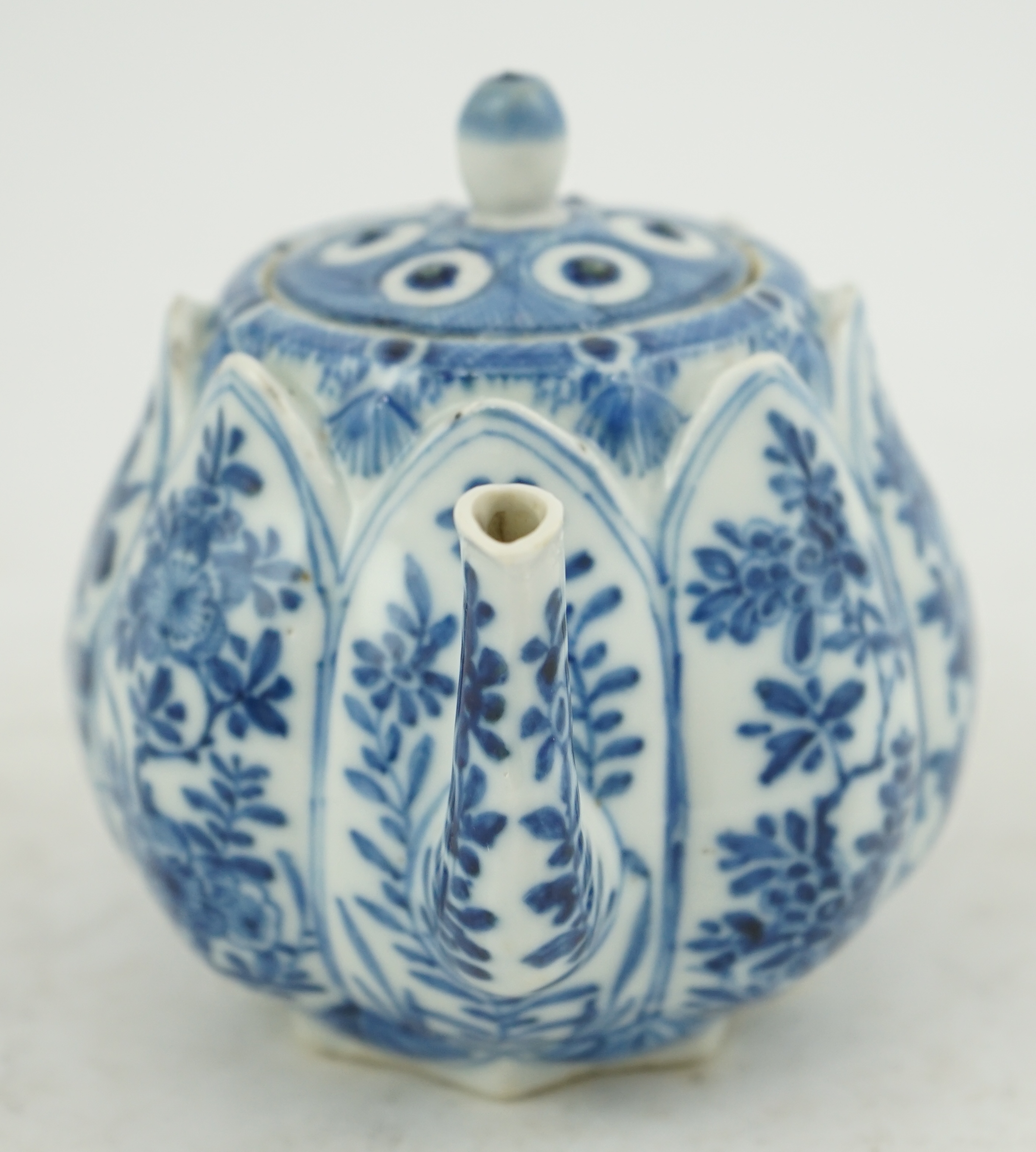 A Chinese blue and white lotus pod-shaped teapot and cover, Kangxi period